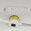 Đèn LED máy may 20 bóng gồm 10 bóng LED trắng và 10 bóng LED UV tím, là giải pháp chiếu sáng chuyên dụng cho máy may công nghiệp. Sản phẩm giúp chiếu sáng rõ khu vực kim may, đồng thời hỗ trợ phát hiện chỉ UV và lỗi trên vải một cách chính xác. Thiết kế cổ ngỗng kim loại linh hoạt giúp người dùng dễ dàng điều chỉnh góc chiếu sáng phù hợp với từng vị trí làm việc.